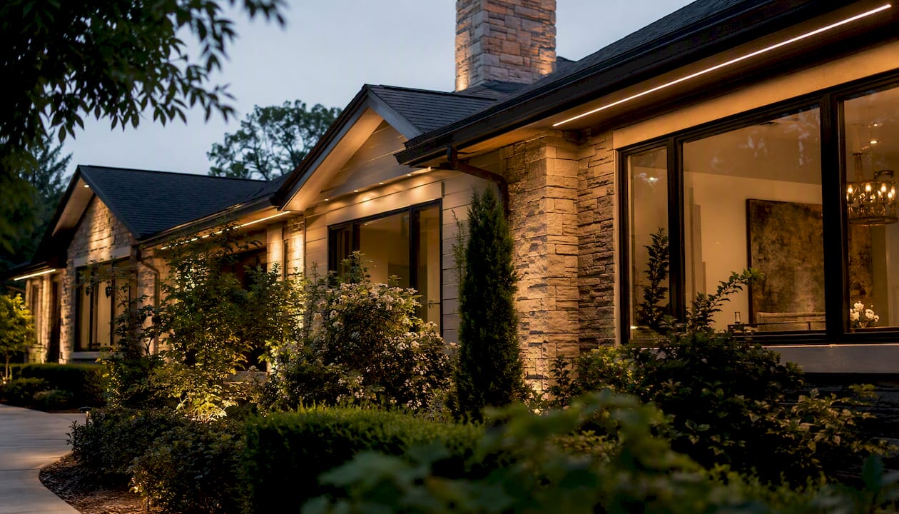 Roofline Lighting That Blends Invisible by Day Daytime street-level view of hidden roofline lighting