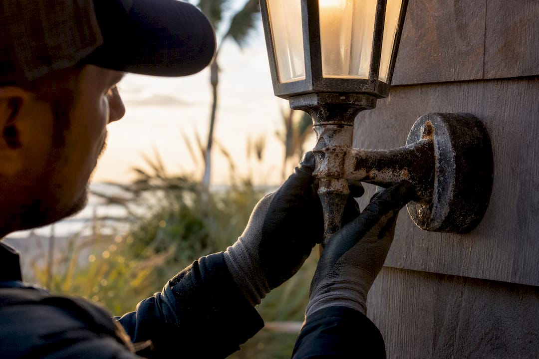 Coastal Lighting Corrosion: What to Demand From Any Fixture Close-up of corroded coastal lighting bracket inspection