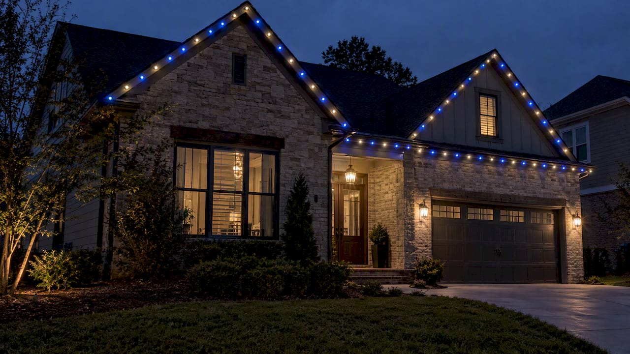 Game-day colors along a Charlotte home roofline