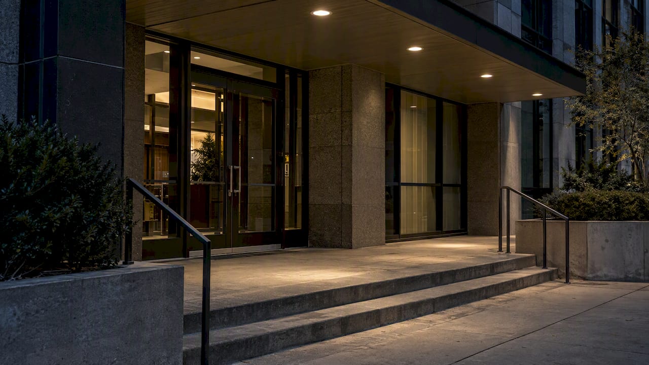 Recessed lights illuminate commercial entry steps