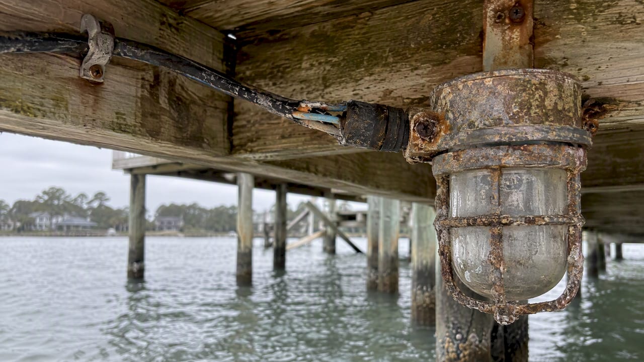 Corroded splice beneath a coastal dock